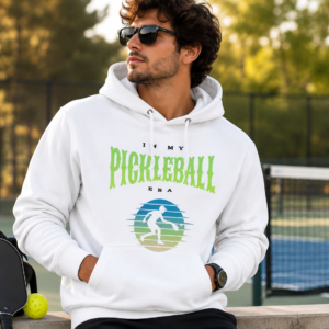 In My Pickleball Era hoodie worn by model, seated pose